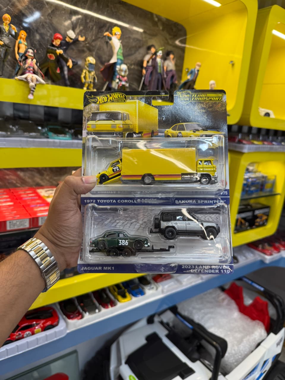 Hot Wheels Premium Car Culture Team Transport 1:64 Diecast Metal Toy Car Set – 1972 Toyota Corolla Sakura Sprinter & Jaguar MK1 with 2023 Land Rover Defender 110